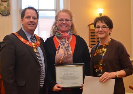Kim Thomson is this year’s recipient of the Town’s Environmental Sustainability Award for an individual. Ms. Thomson was instrumental in starting a community garden at Princess Elizabeth Public School in 2013. She accepted the award from Mayor Rob Adams and Councillor Sylvia Bradley, chair of the Orangeville Sustainability Action Team.